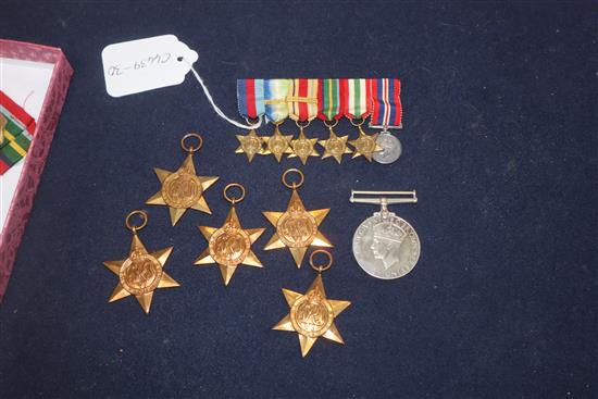 A WW2 medal group of six to Lieut. G.I.L. Greenlees RNVR and matching miniatures